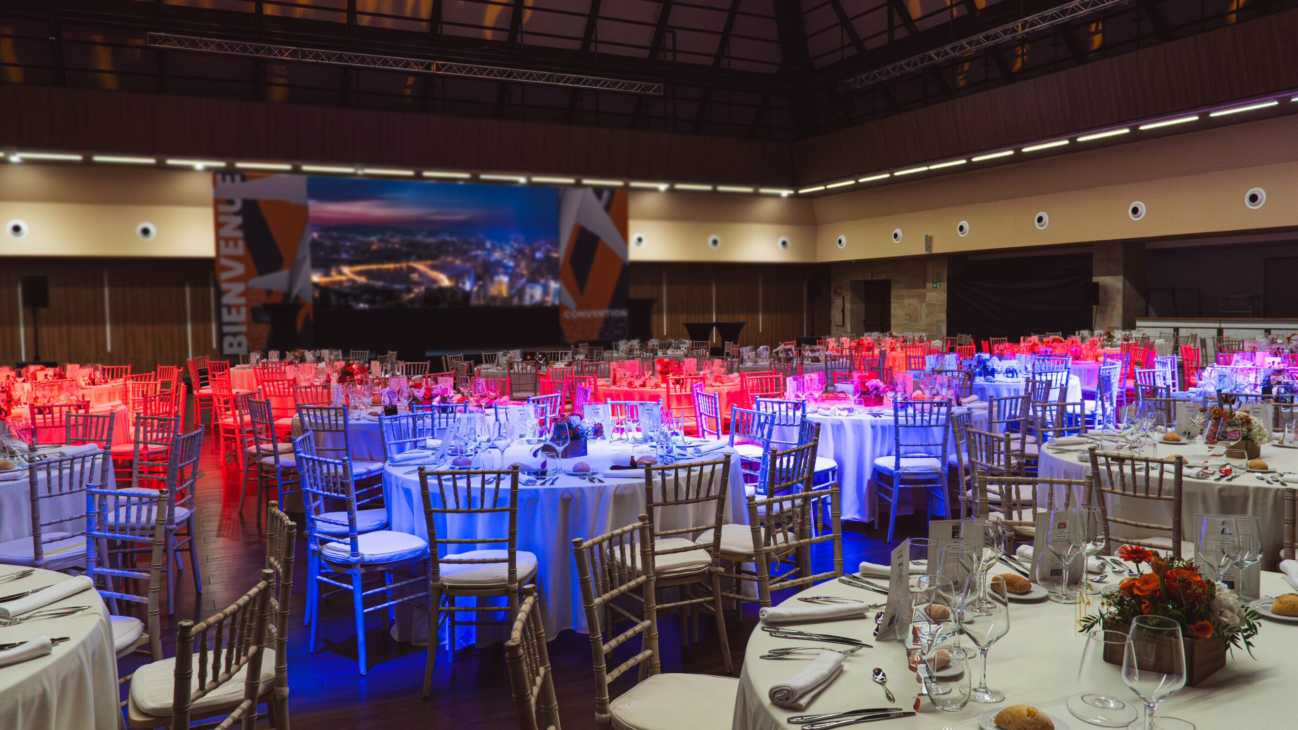 Corporate Event Venue, with Chairs and Tables decorated and room lit ready for an exhibition